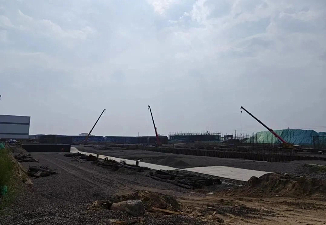 6月 乐甯铁精粉项目主厂房深基坑垫层施工完成.jpg