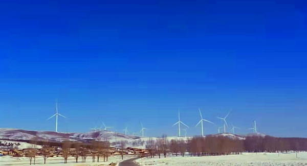 孩子眼中的大风车  吹动绿色奥运的新能源