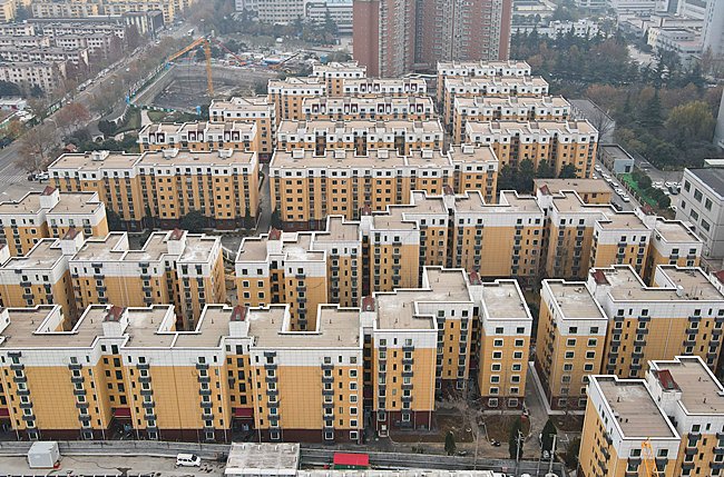 用实干之笔 绘旧区新颜